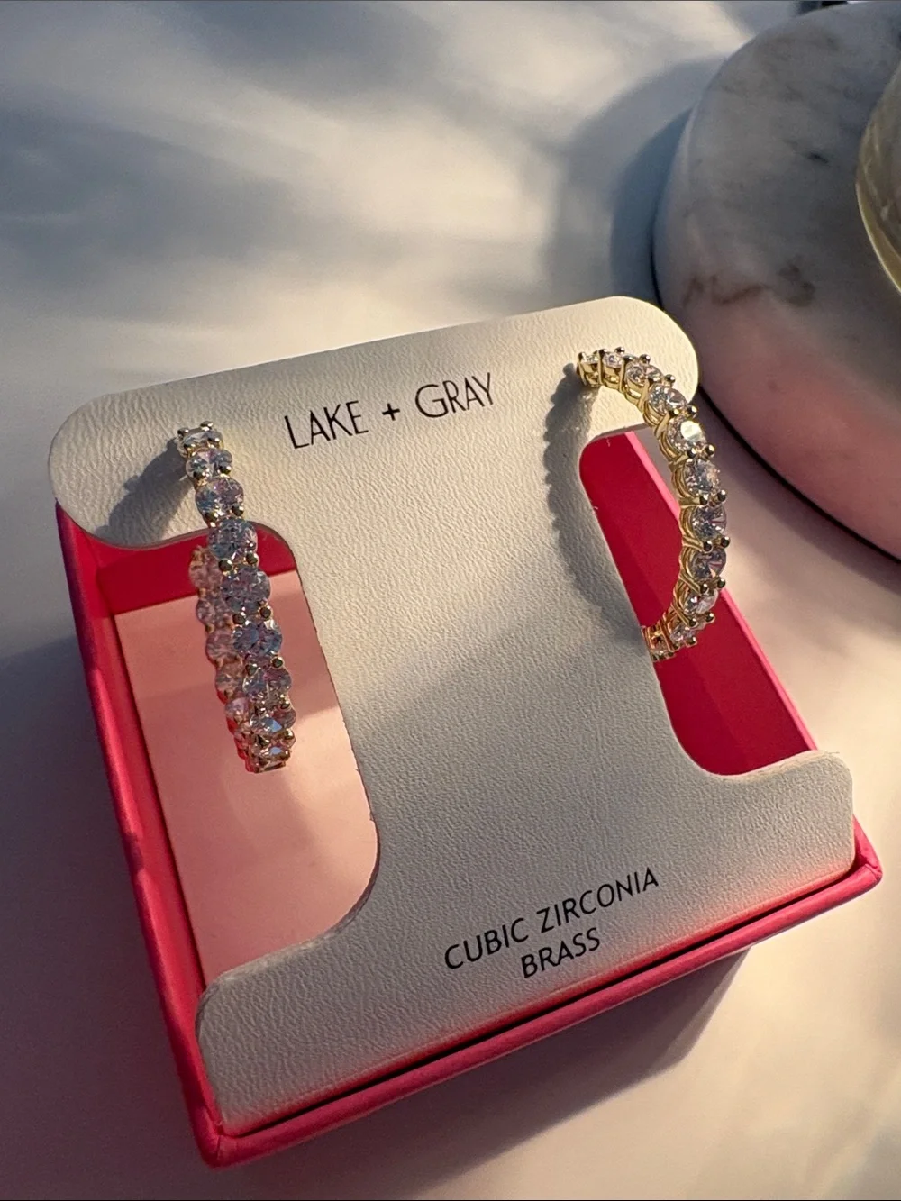 New in box Lake and Gray Gold/CZ Stone earrings